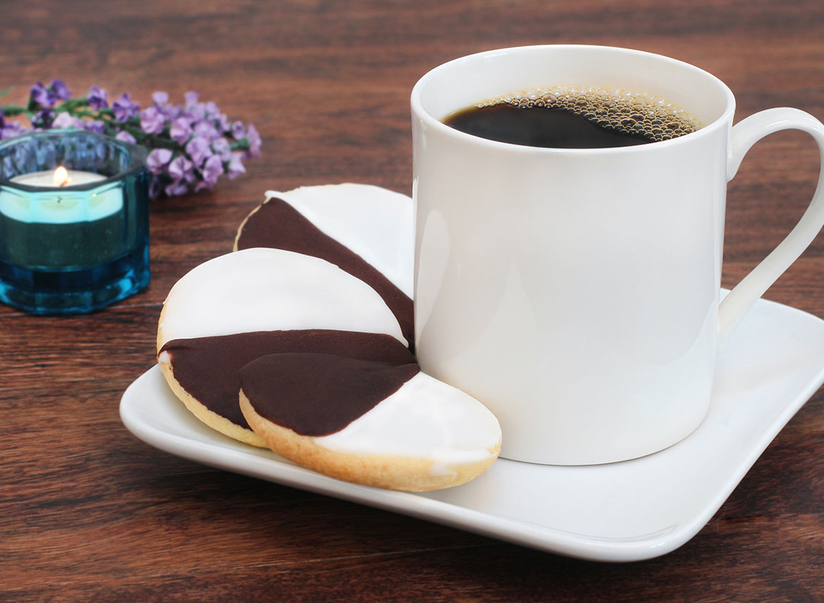 black and white cookies with coffee on plate
