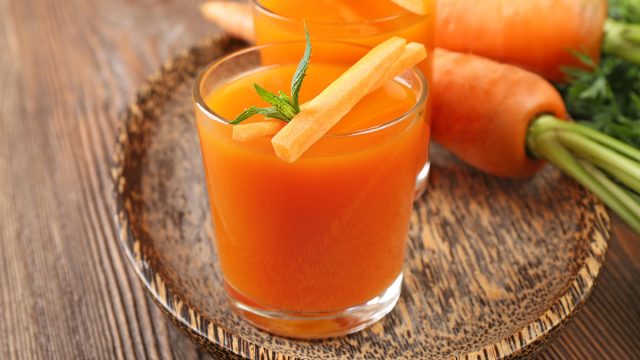 carrot juice glass carrot garnish