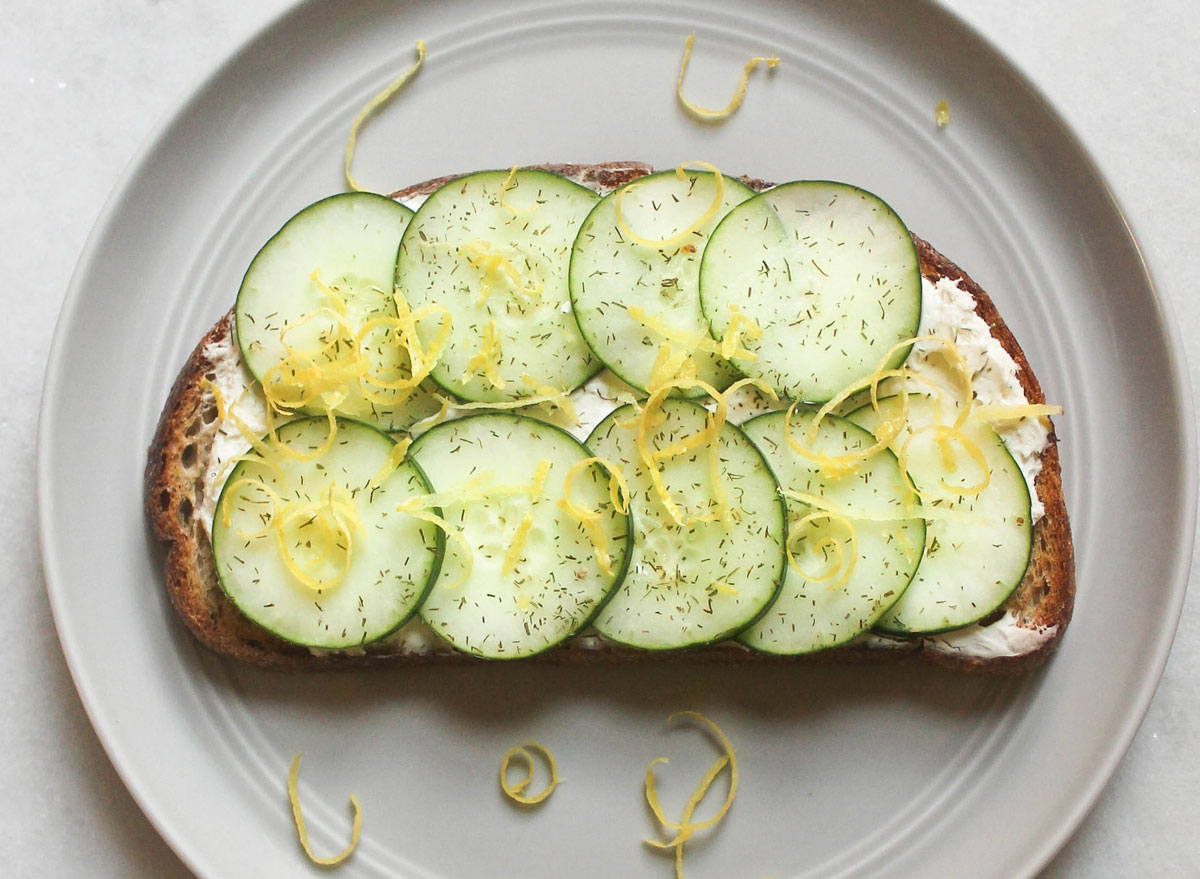 cream cheese cucumber lemon dill toast on grey plate marble counter