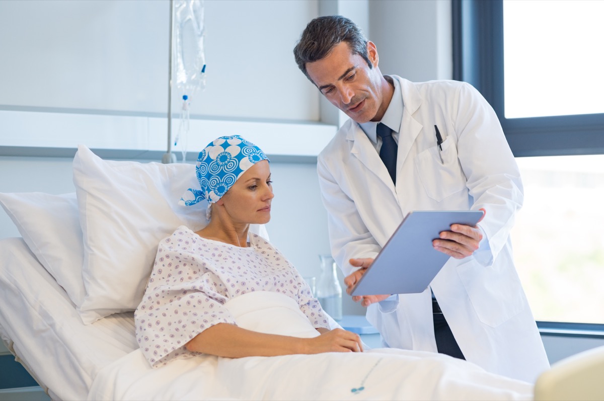 Doctor telling to patient woman the results of her medical tests