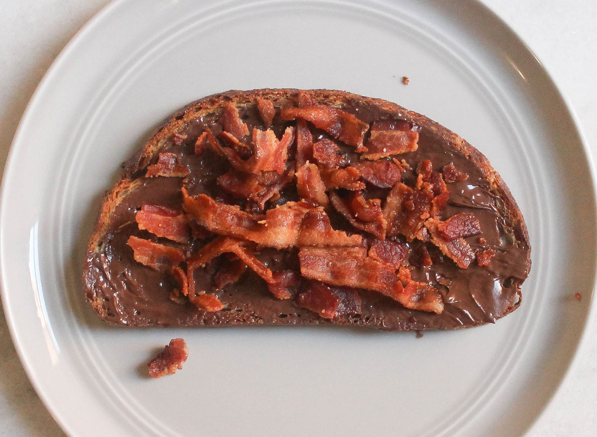 hazelnut spread bacon maple syrup toast on grey plate and marble counter