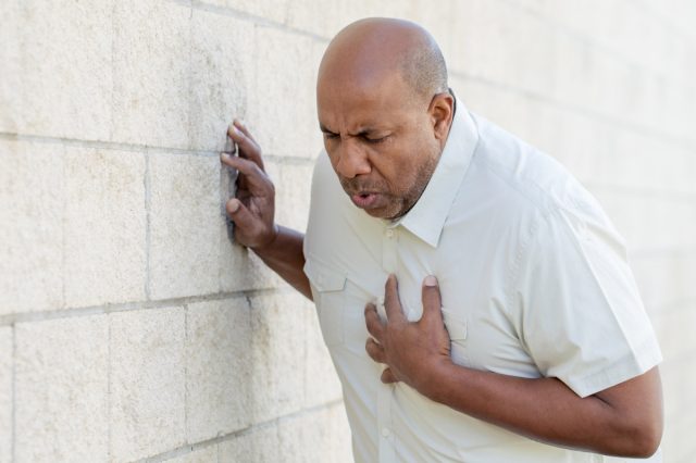 A man suffering from a heart attack