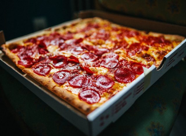 Sicilian style pizza in a pizza box with pepperoni
