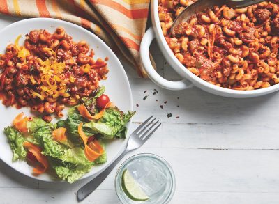 slow cooker beef goulash in a white serving dish