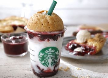 starbucks american cherry pie frappucino with domed pie crust and slice of cherry pie on a plate