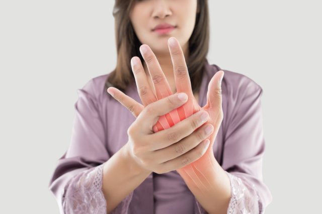 woman suffering from pain in bone