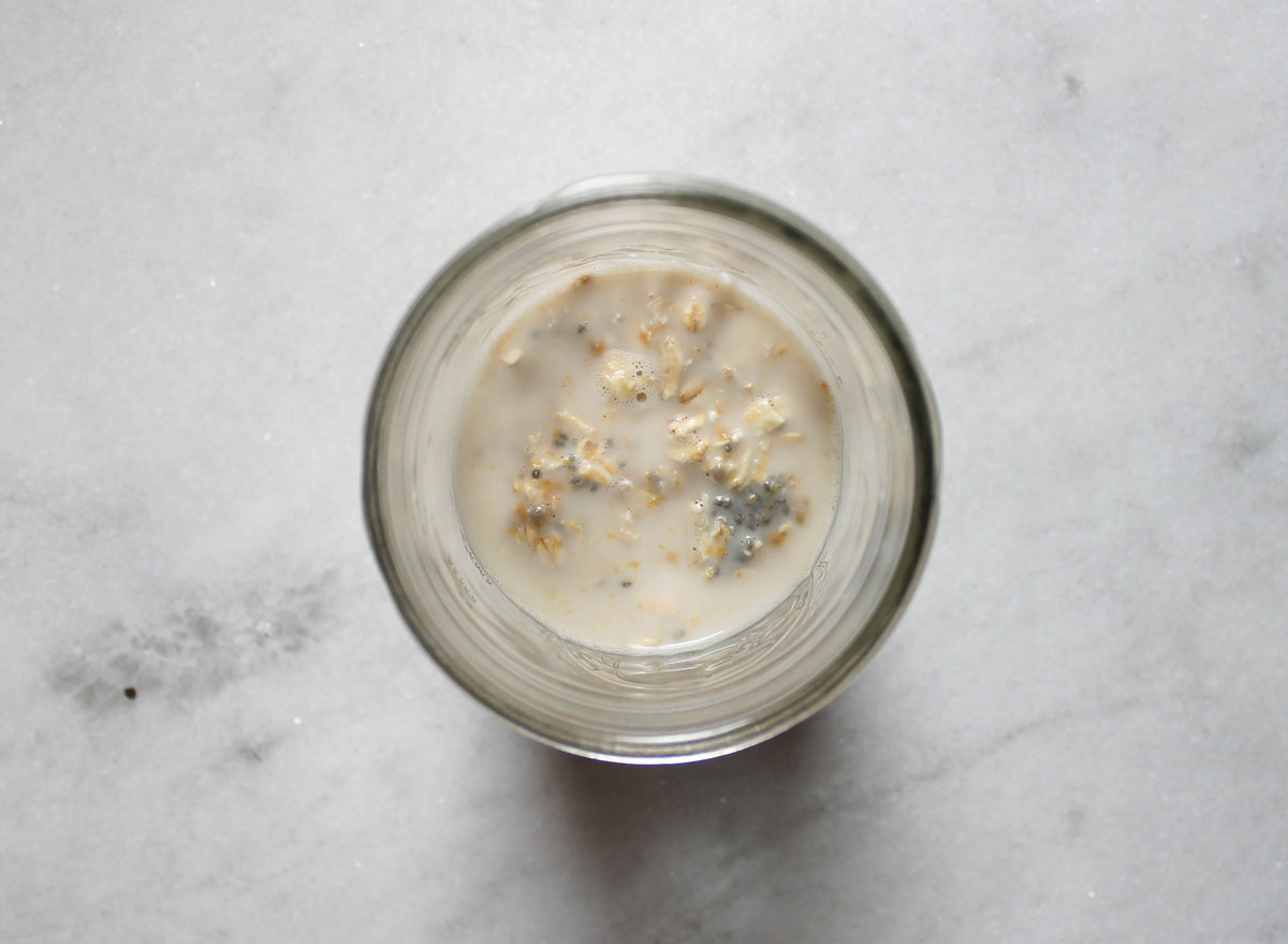 overnight oats before soaking, submerged in milk 
