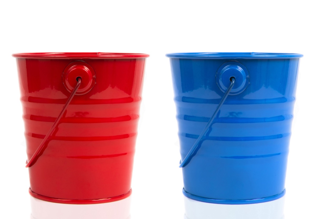 two buckets over white background