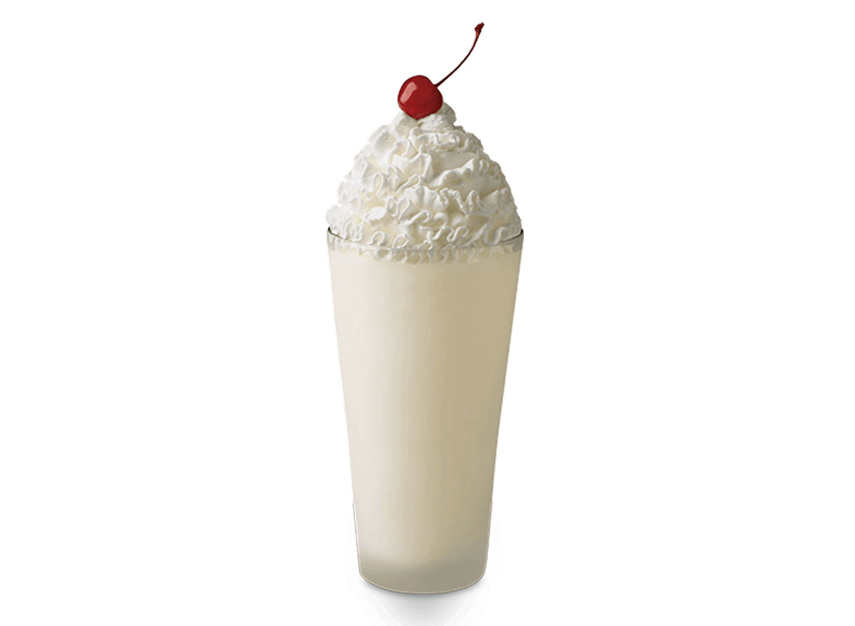 chick fil a vanilla milkshake on a white background with cherry on top