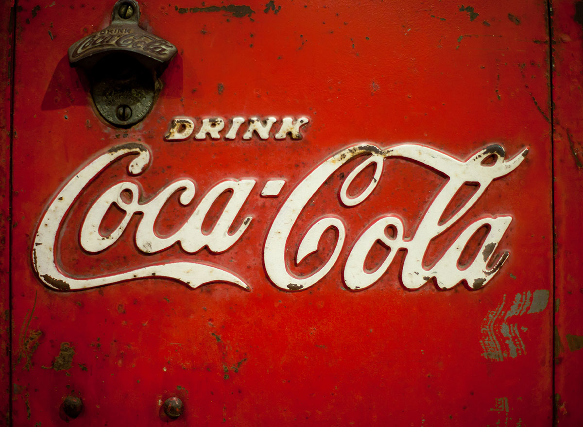 old coke opener on logo