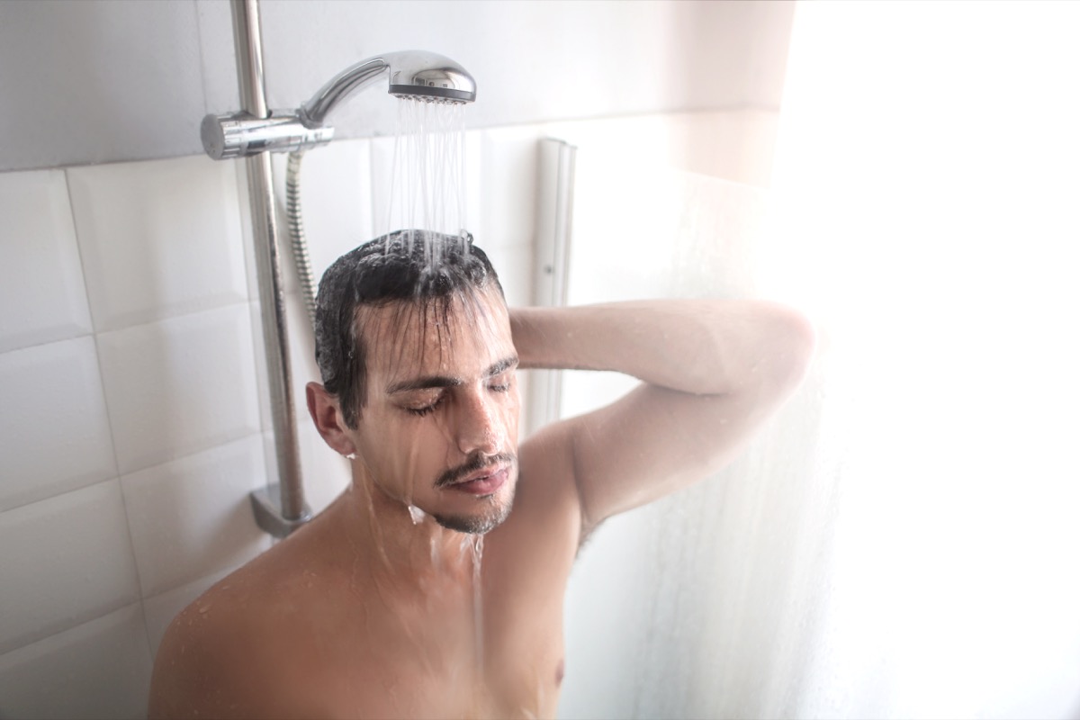 Man warming up in the shower