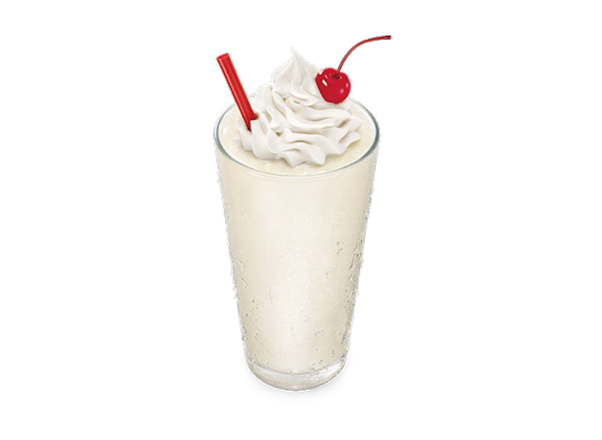 sonic vanilla milkshake on a white background with red straw and cherry