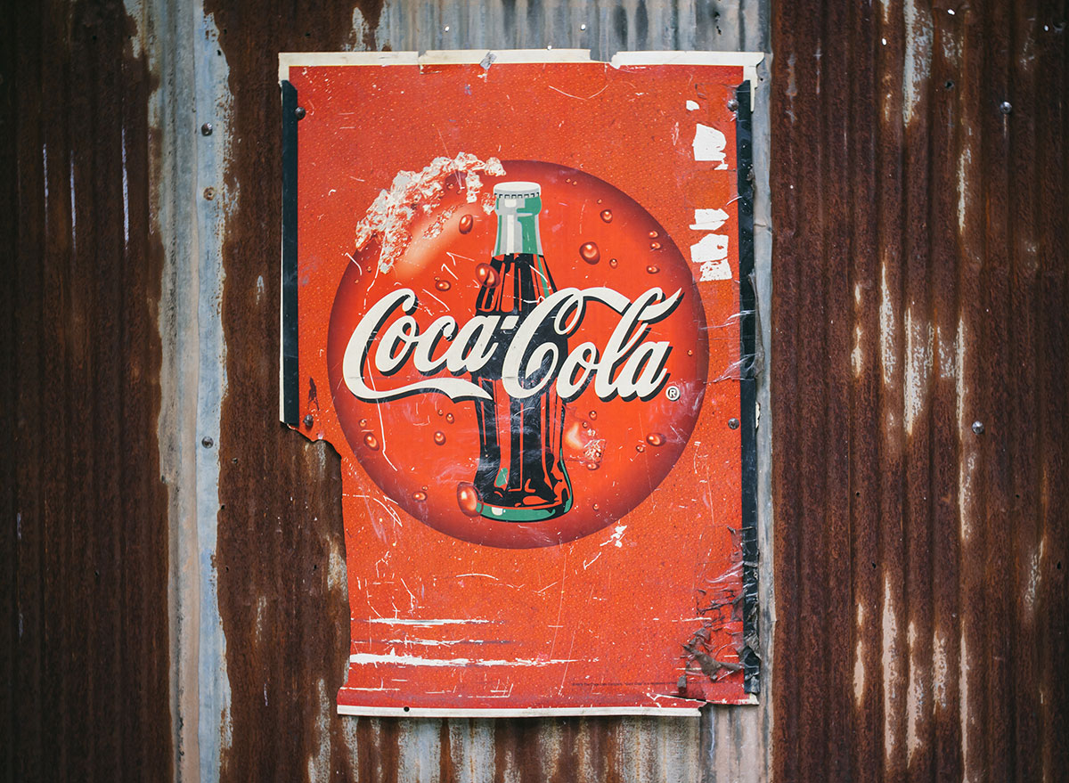 worn down vintage coke ad