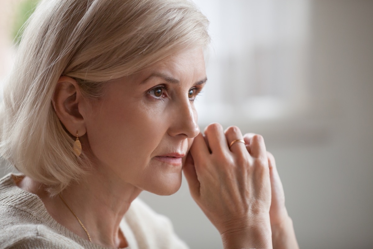 serious anxious mature senior woman