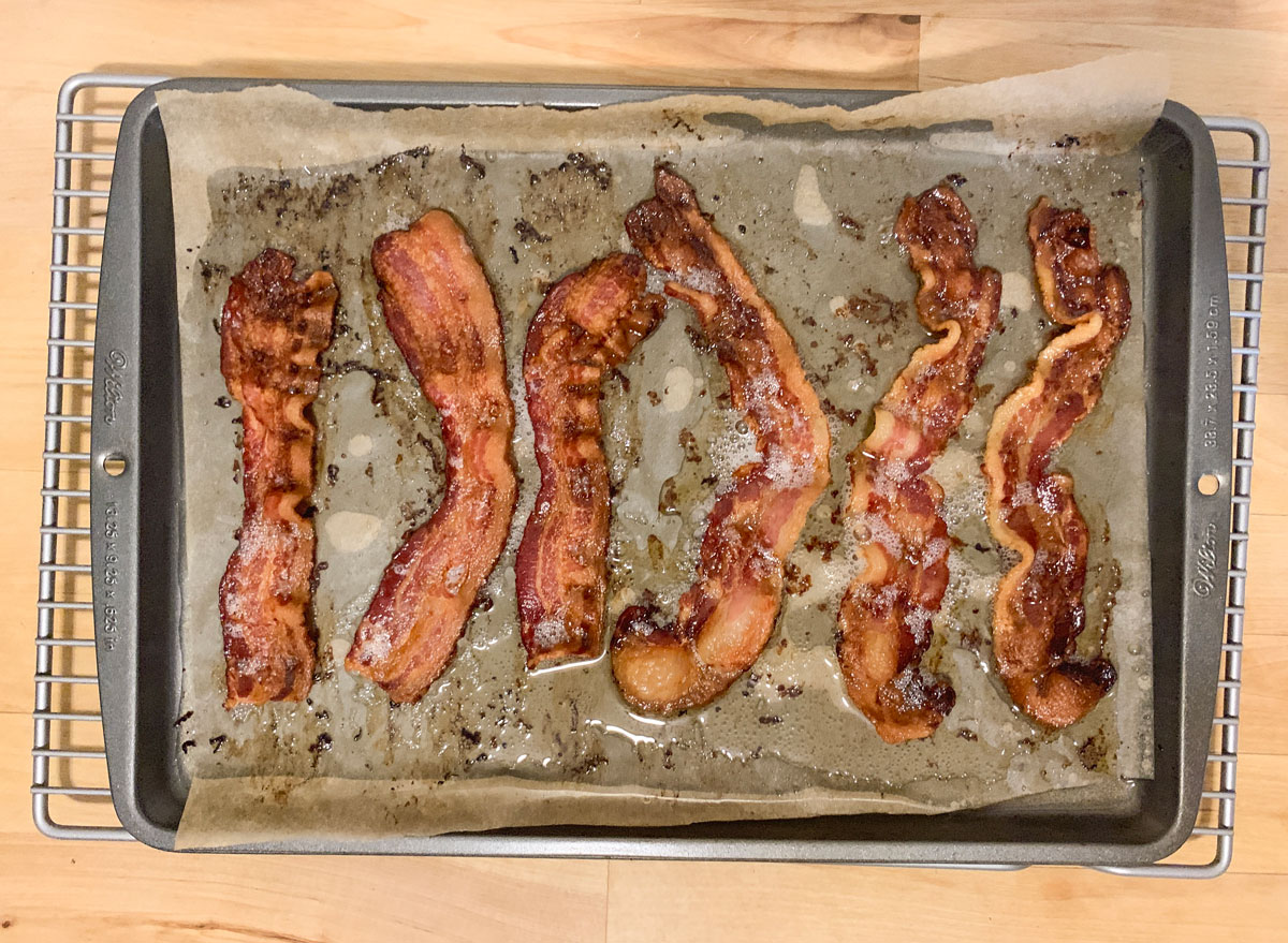 https://www.eatthis.com/wp-content/uploads/sites/4/2019/08/bacon-from-the-stove.jpg