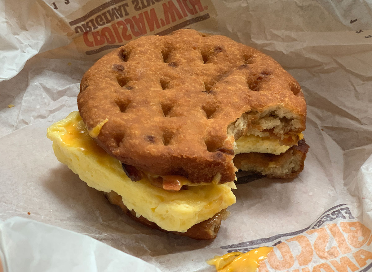 burger king bacon waffle sandwich with bite