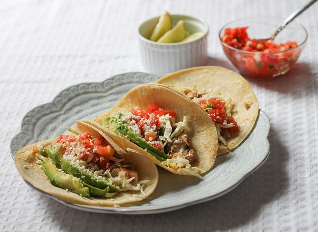 Three fish tacos on a plate