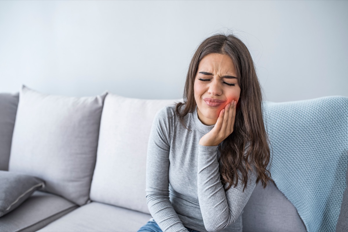 Woman Suffering From Terrible Strong Teeth Pain