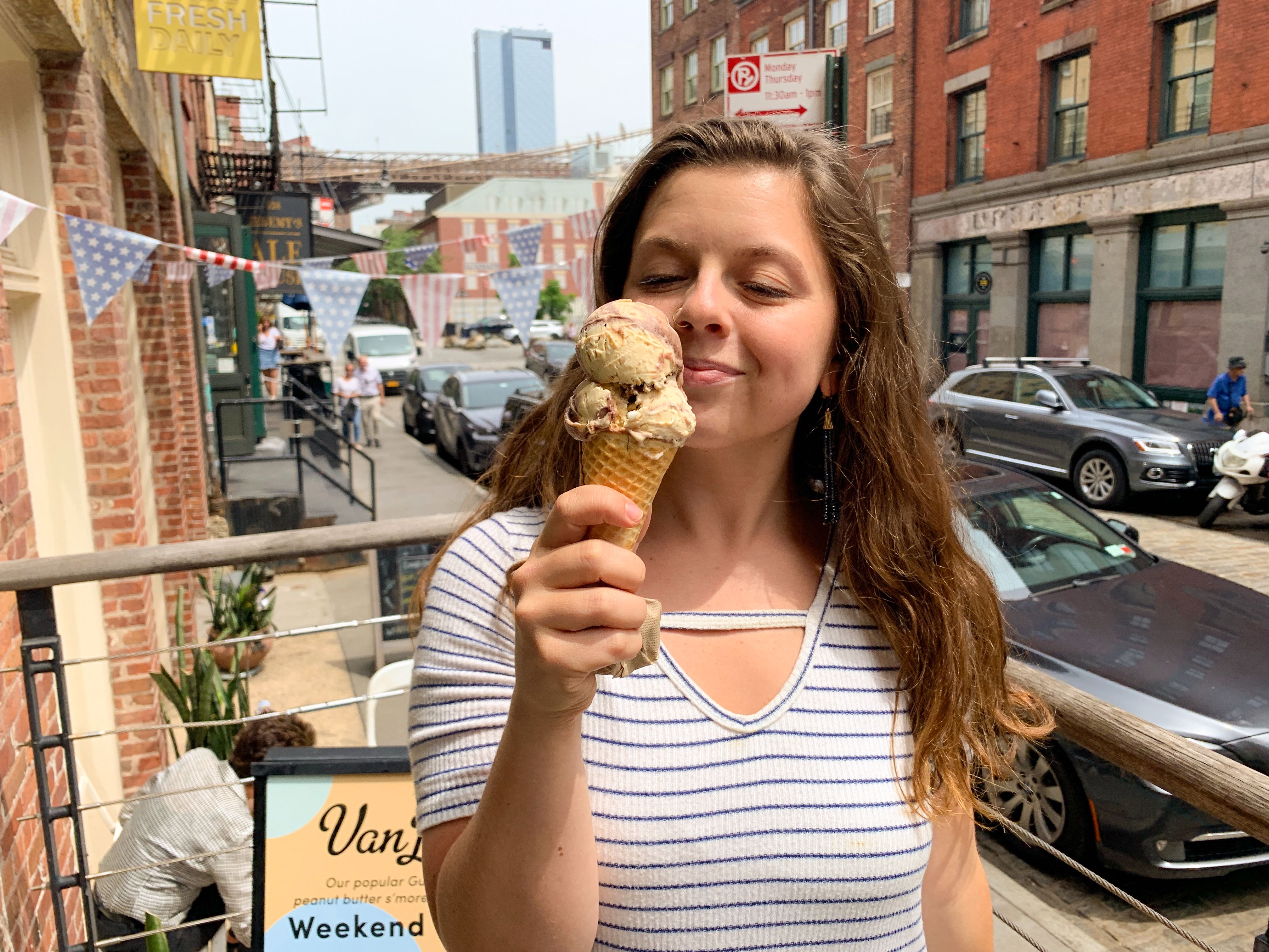 eating ice cream outside in the city during summer