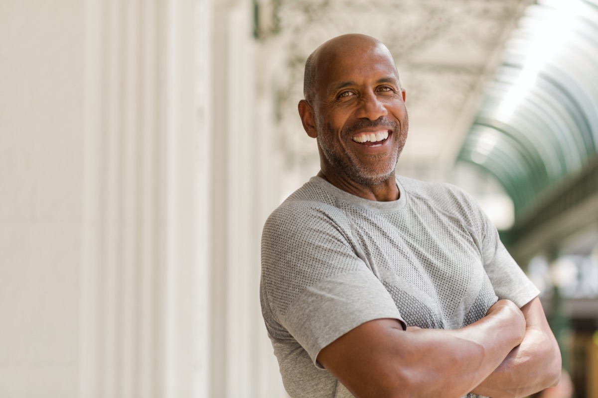 Mature African American man smiling.