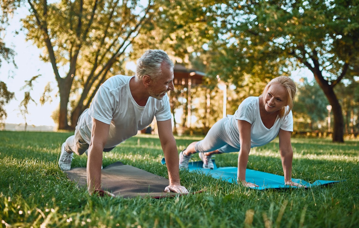 couple is doing sport outdoors