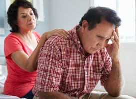 Comforting Senior Husband Suffering With Dementia
