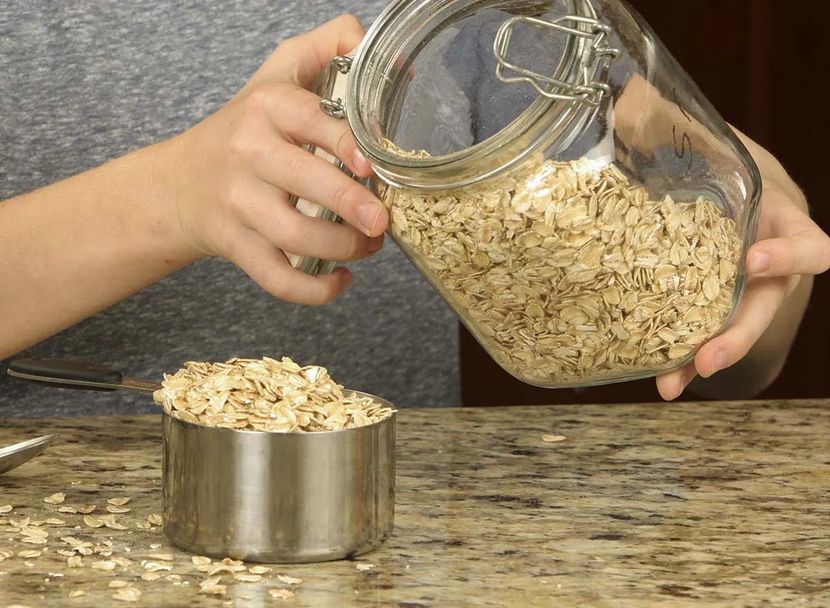rolled cut oats being measured