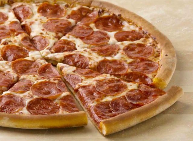 papa johns pepperoni pizza with slice being served
