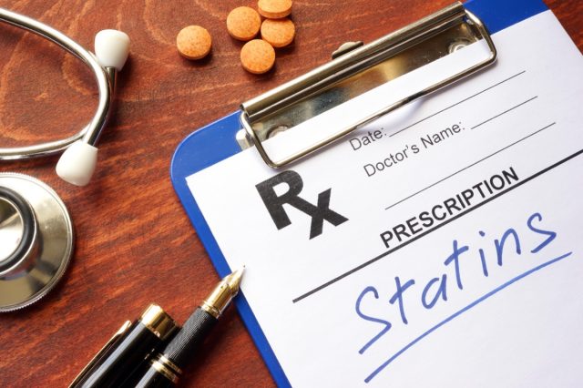 written prescription statins and stethoscope