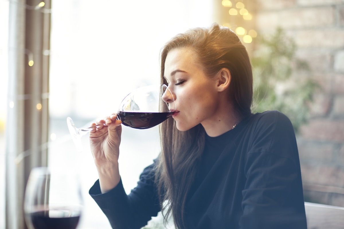woman drinking red wine