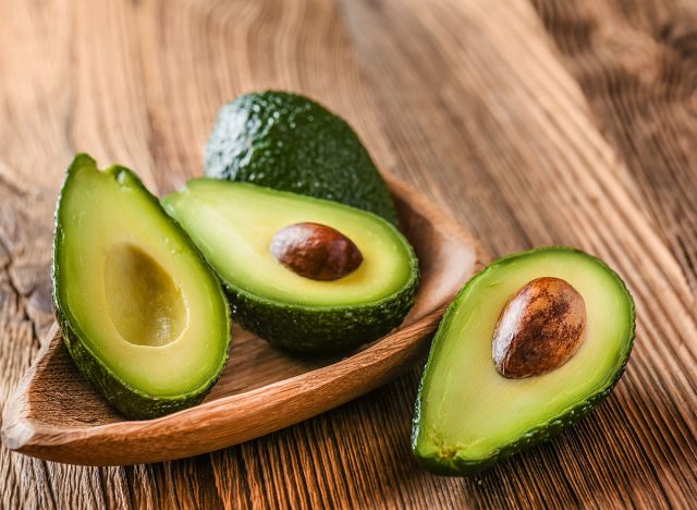 avocado halves in a bowl