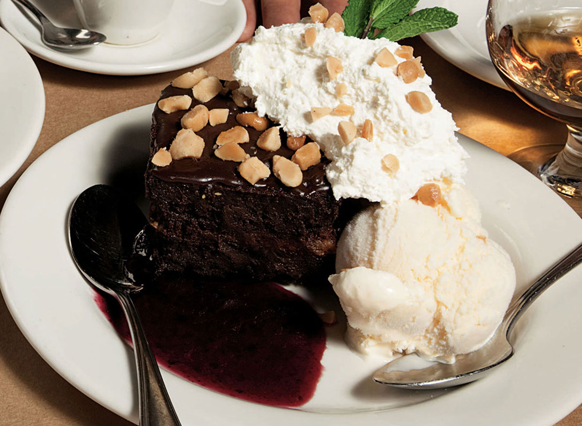 bonefish grill brownie on plate with ice cream and whipped cream