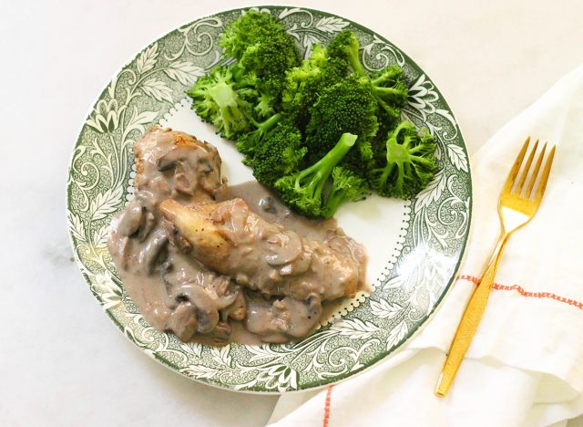 Copycat Carrabba's chicken marsala with steamed broccoli on a plate
