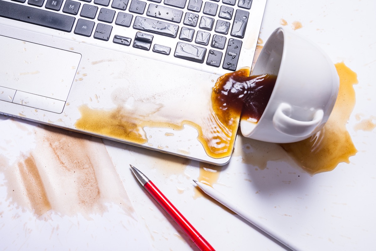 Spill coffee on a computer keyboard