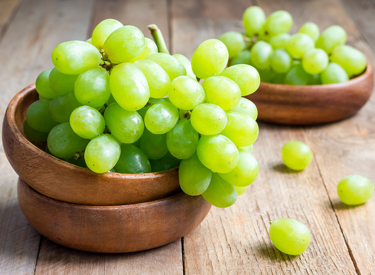 bunches of green grapes in the bowl