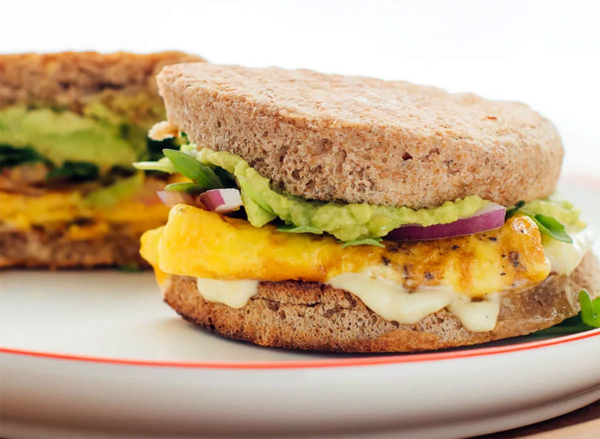 Healthy breakfast sandwich with avocado spread and egg