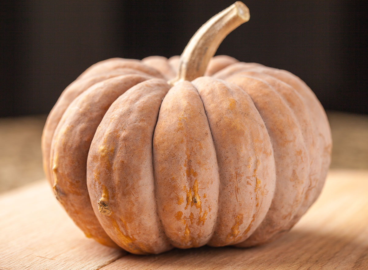 long island cheese pumpkin on wooden table