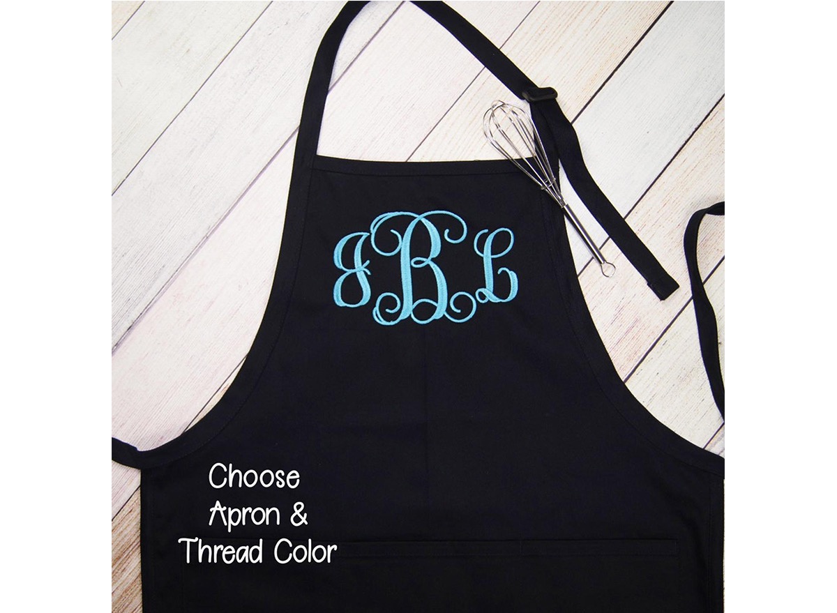 black apron with blue lettering, monogrammed kitchen accessories