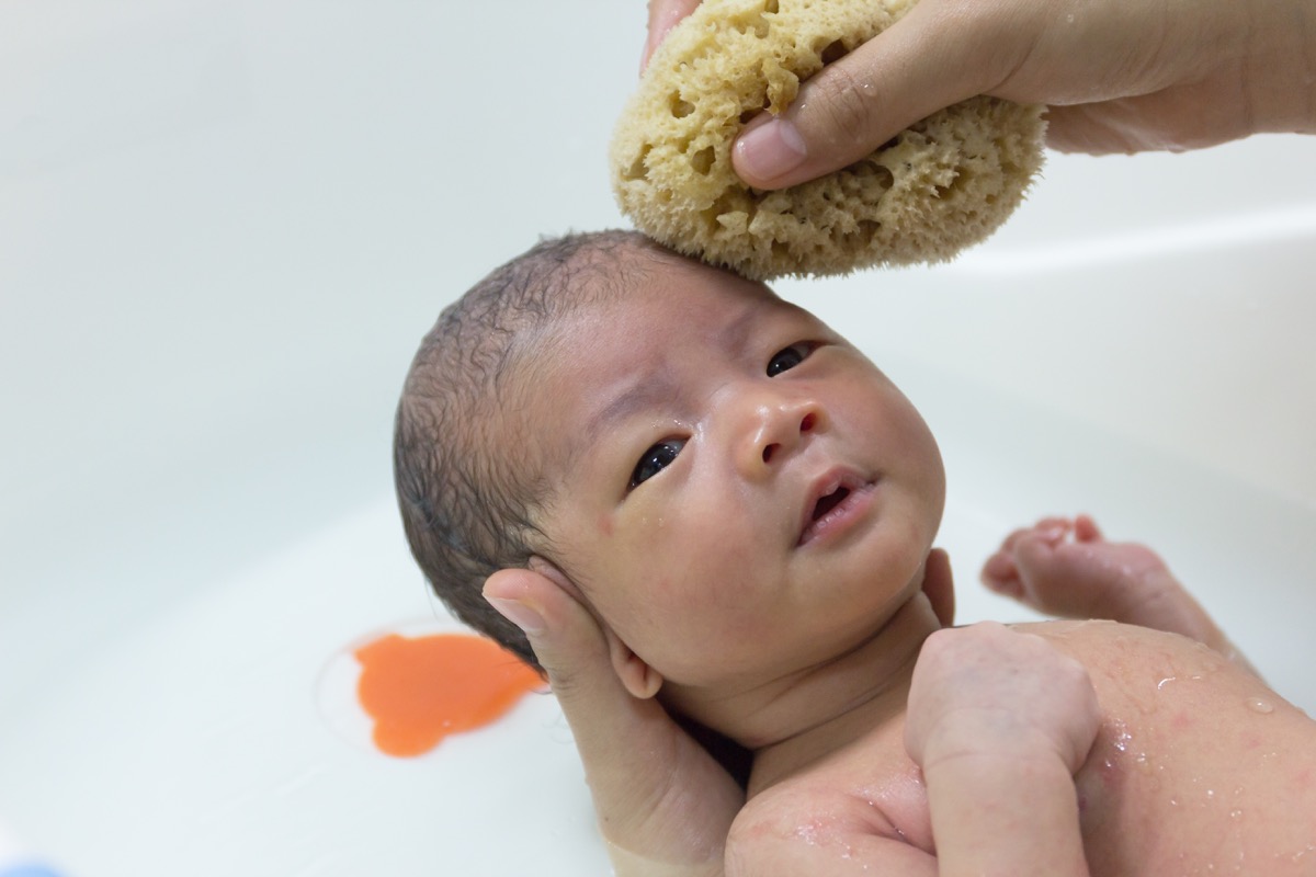 new born baby wash face