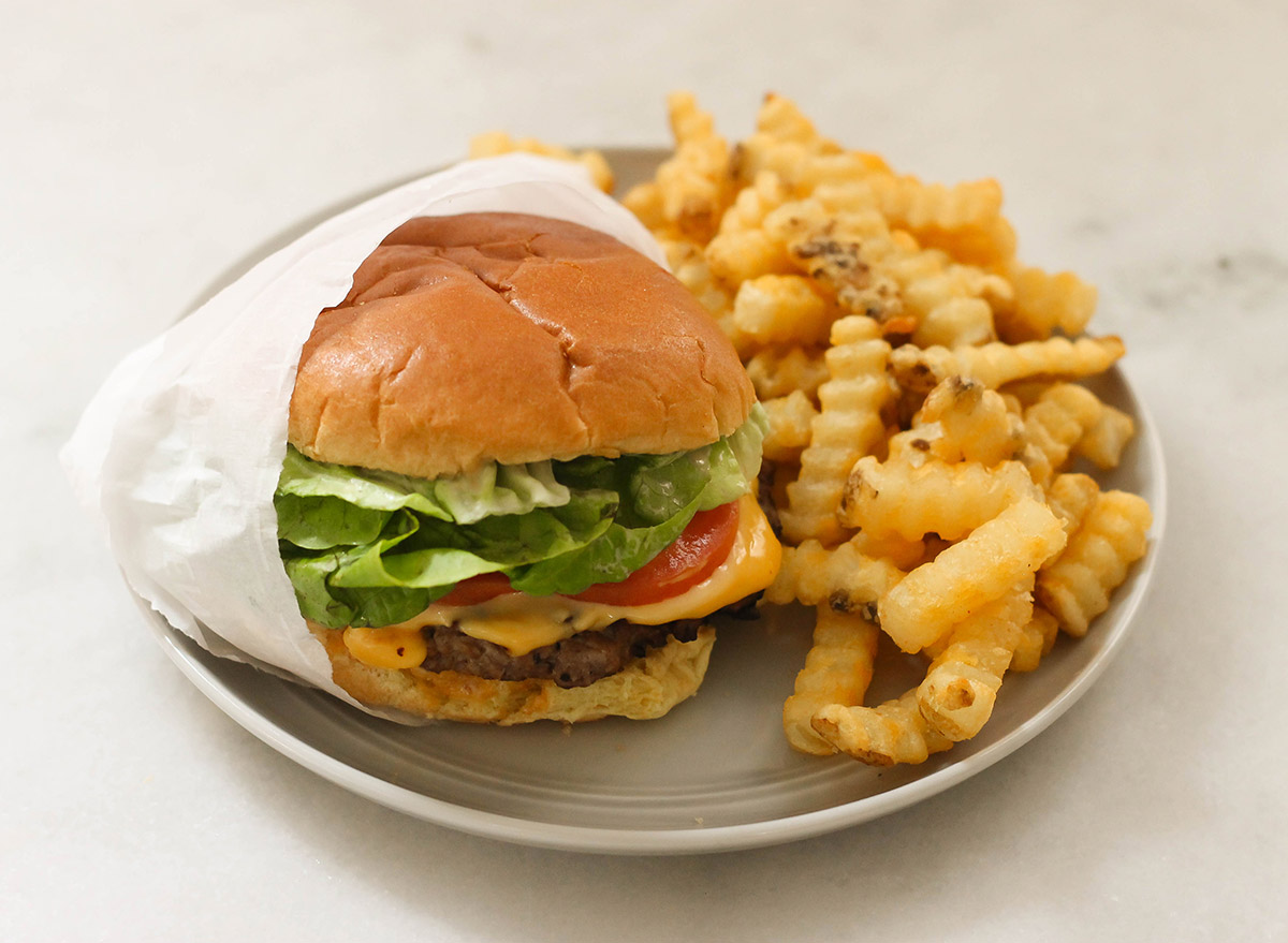 Copycat shake shack burger with crinkle cut fries to enjoy at home