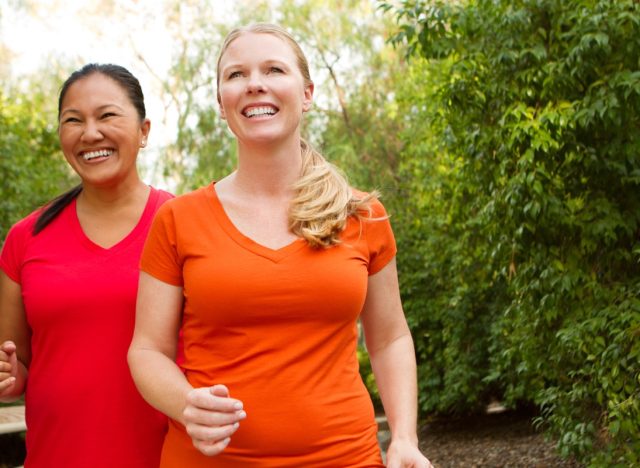 Women walking and exercising smilling and happy