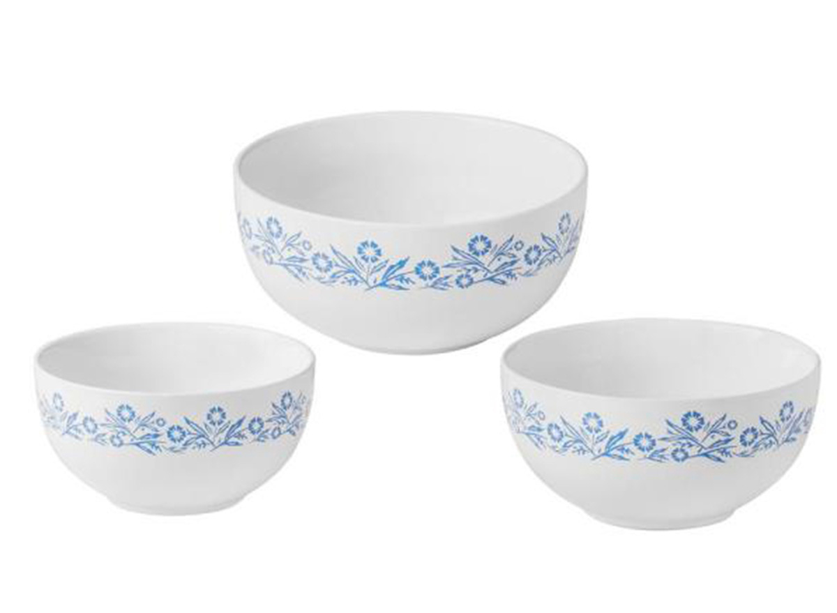 three white bowls with blue floral design 