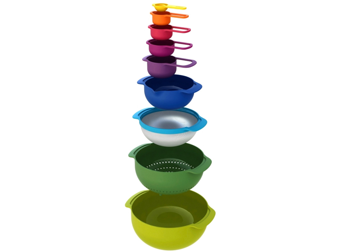 colorful mixing bowls and measuring cups 