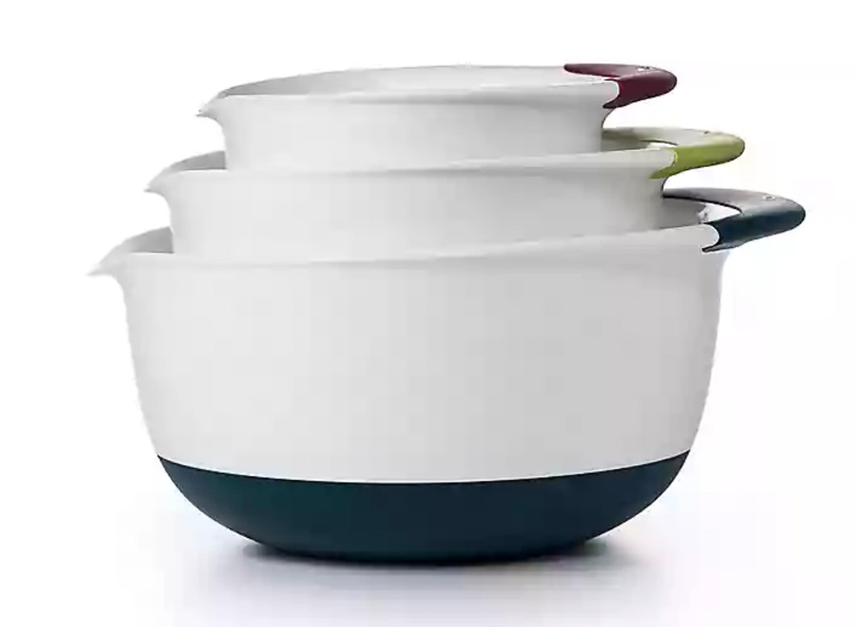 white mixing bowls with colorful spouts