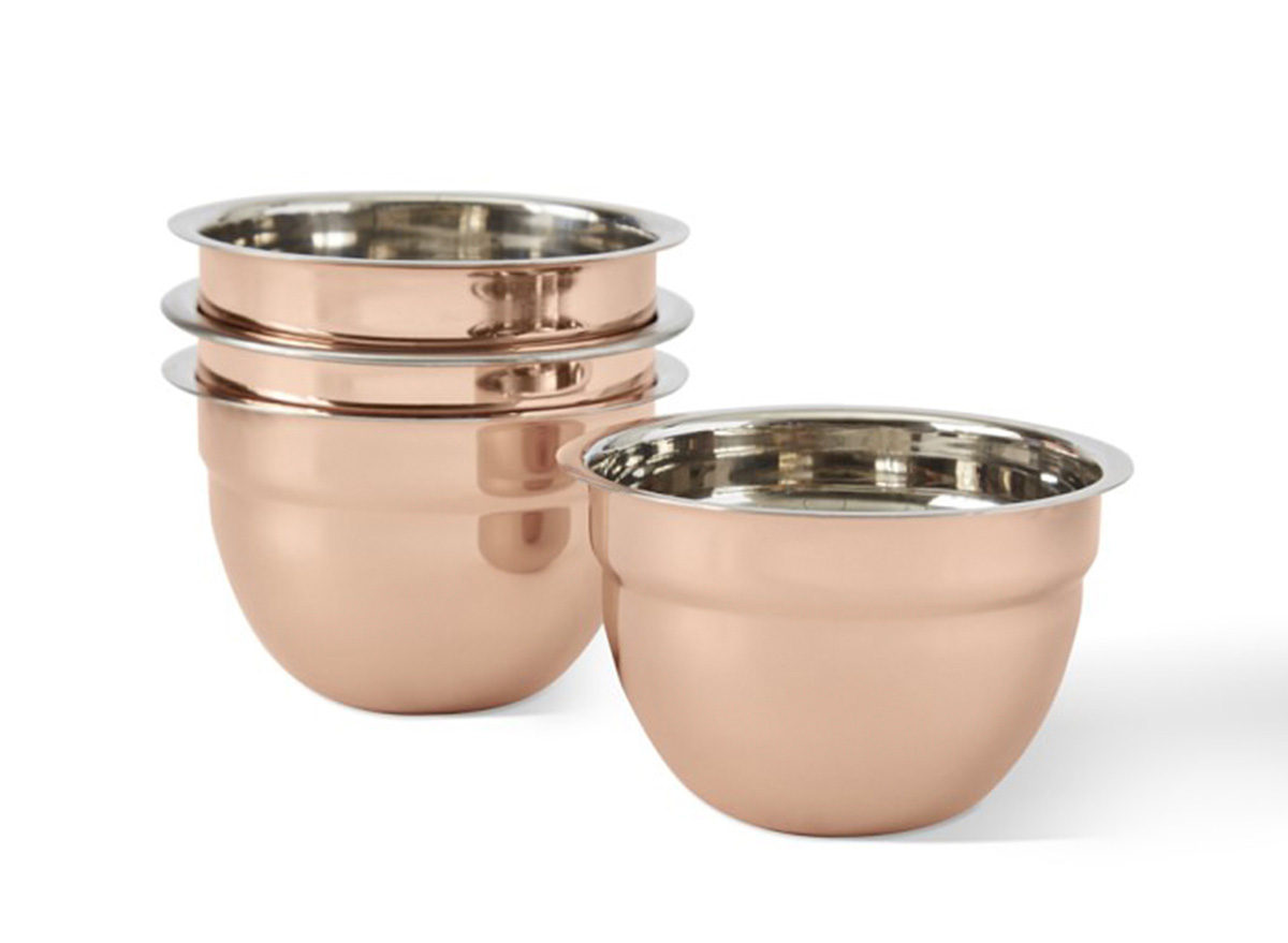 four copper mixing bowls