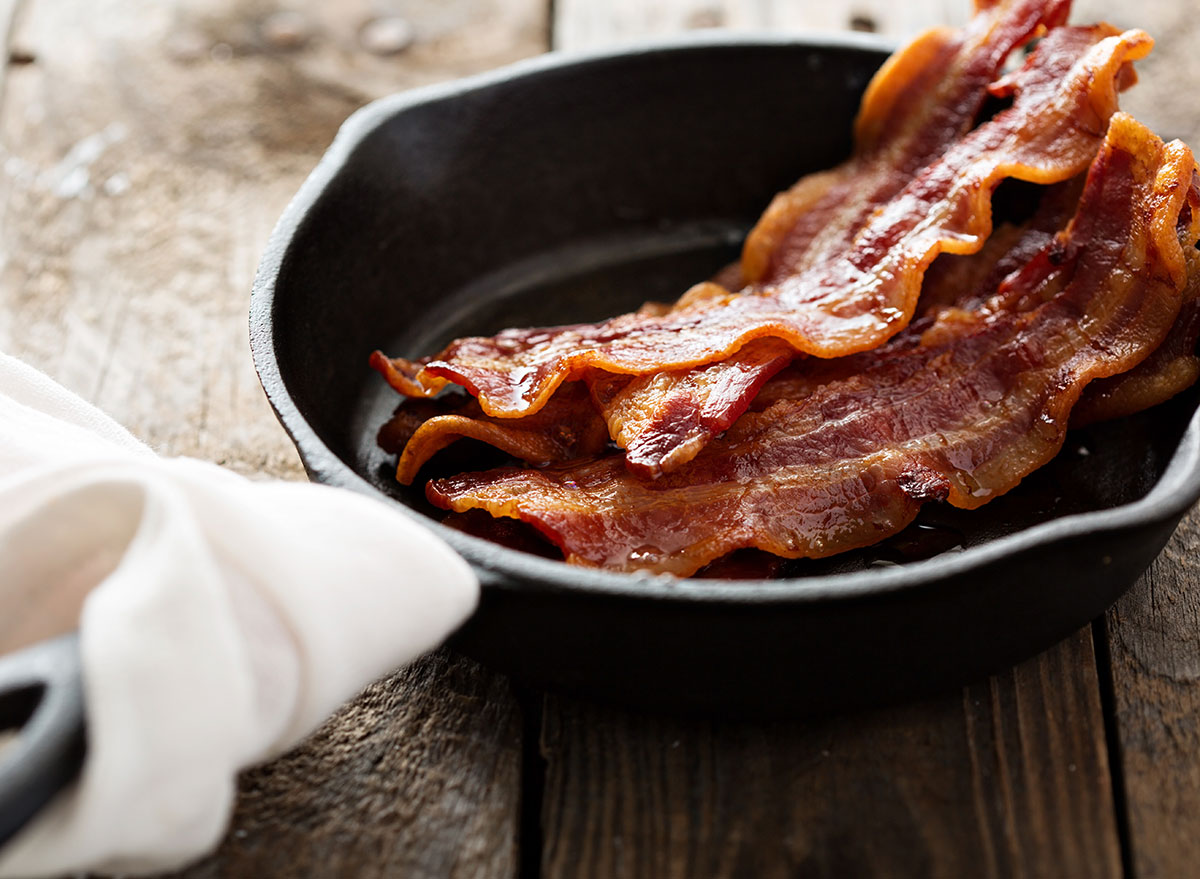 Bacon in a small skillet ready to eat for breakfast