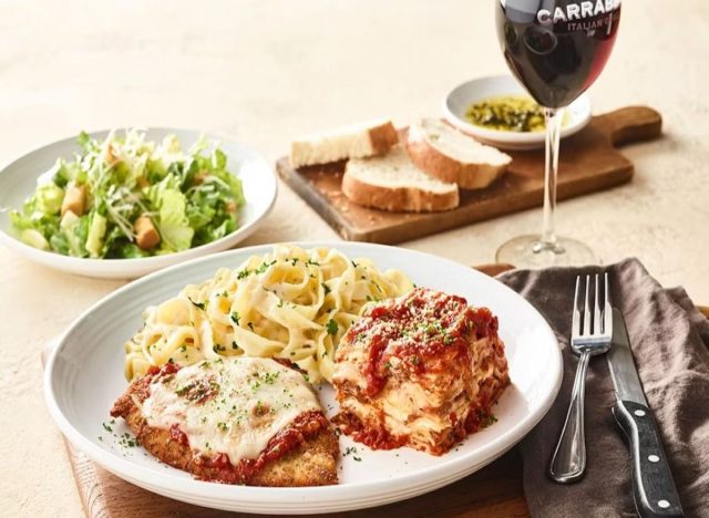 Carrabba's meal on a table with red wine