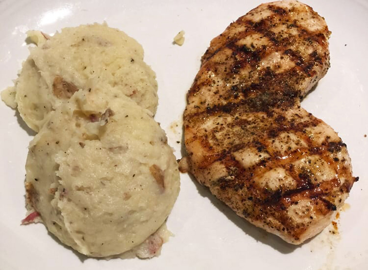 carrabbas tuscan grilled chicken with a side of mashed potatoes