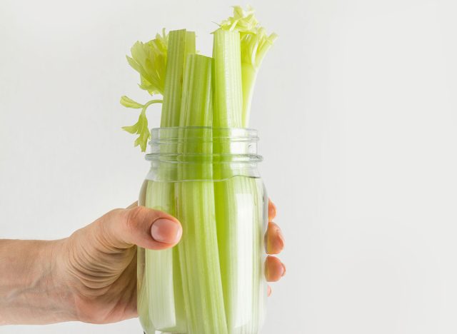 Celery stored in a jar with water