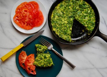 egg and herb frittata in skillet and on plate